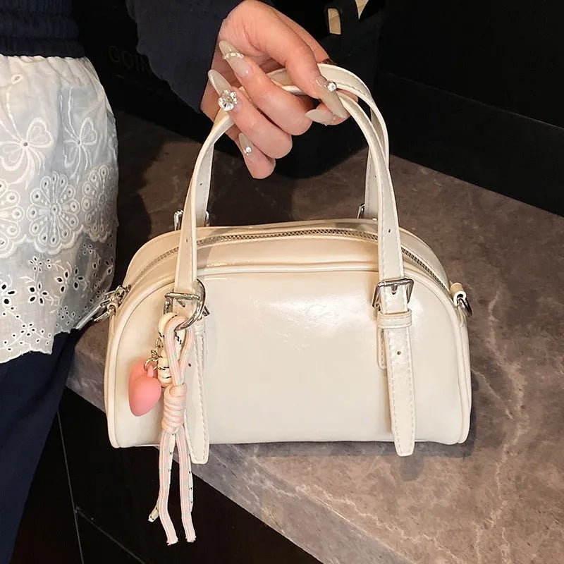 Korean style small square shoulder bag in soft PU leather with shell silhouette