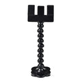 Black pet selfie stick with rotating snack clip attached to mobile phone for animal photography