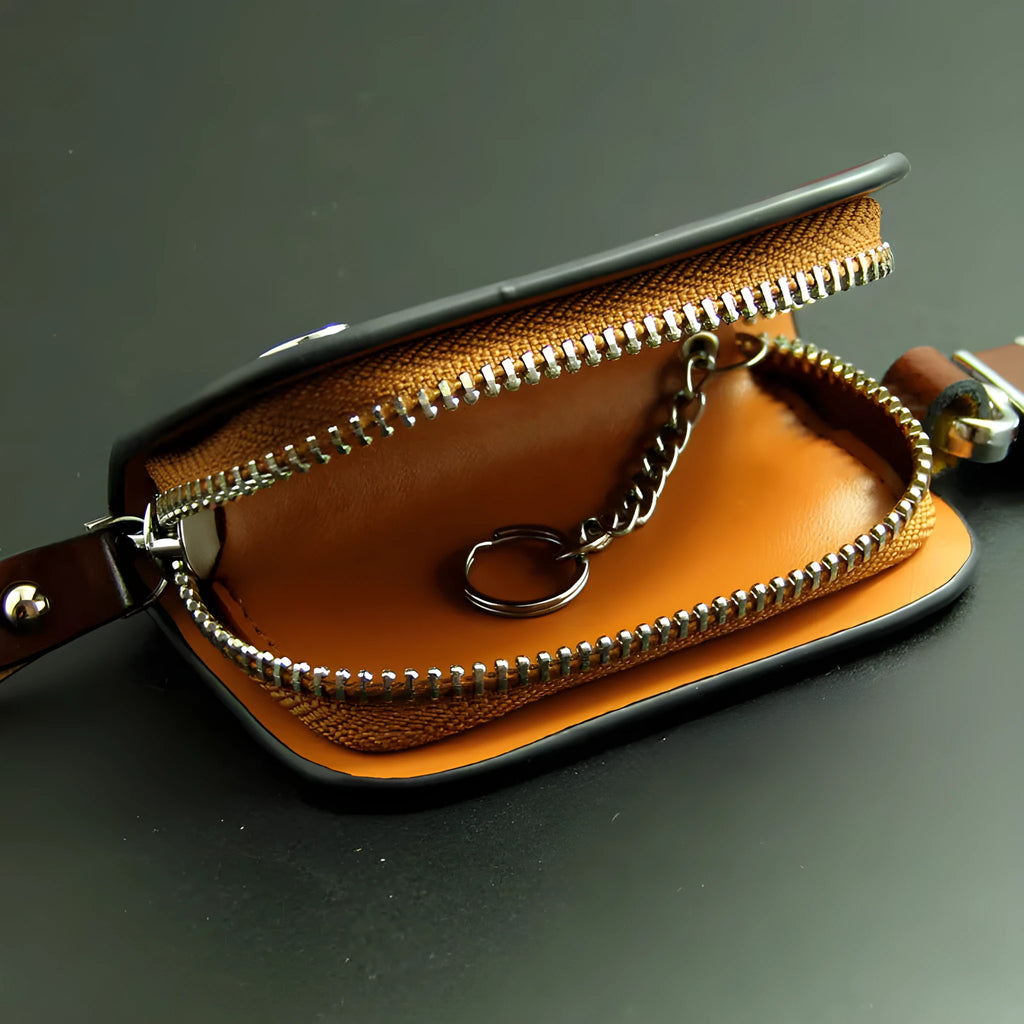 Genuine cowhide leather car key case with frosted finish showing black and brown colour options