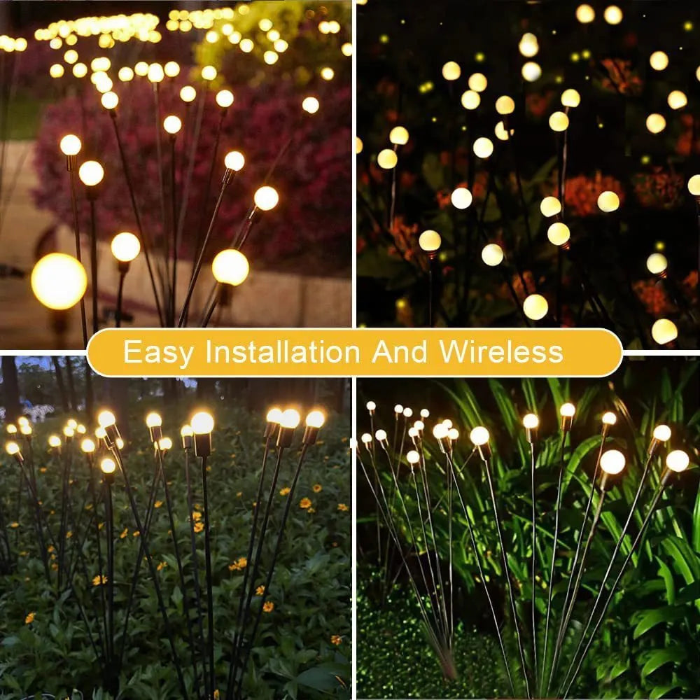 Solar powered LED ground spike garden light with multiple warm white and colour LED heads on stainless steel stake.