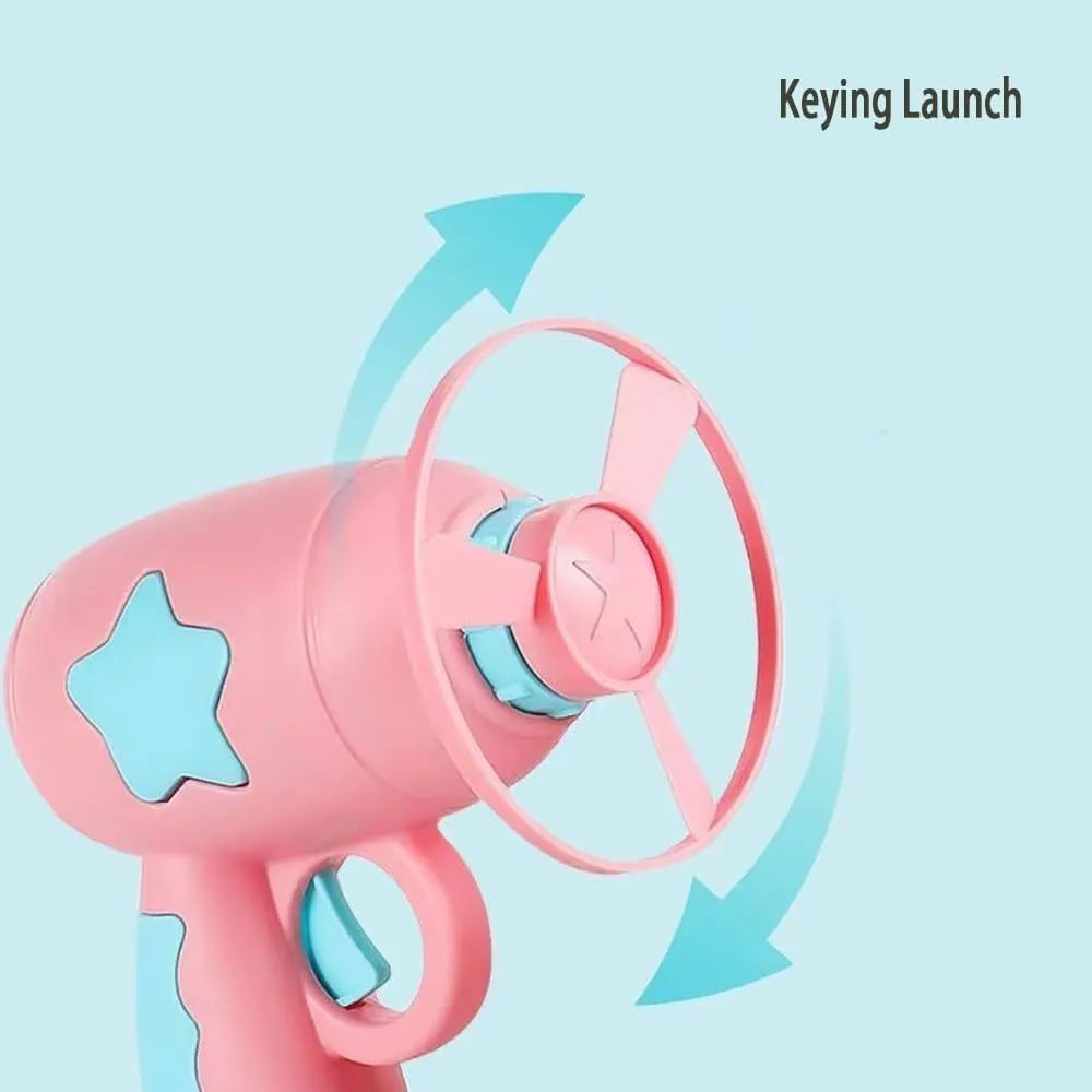 Blue plastic cat toy gun with spinning Frisbee disc for indoor cat play