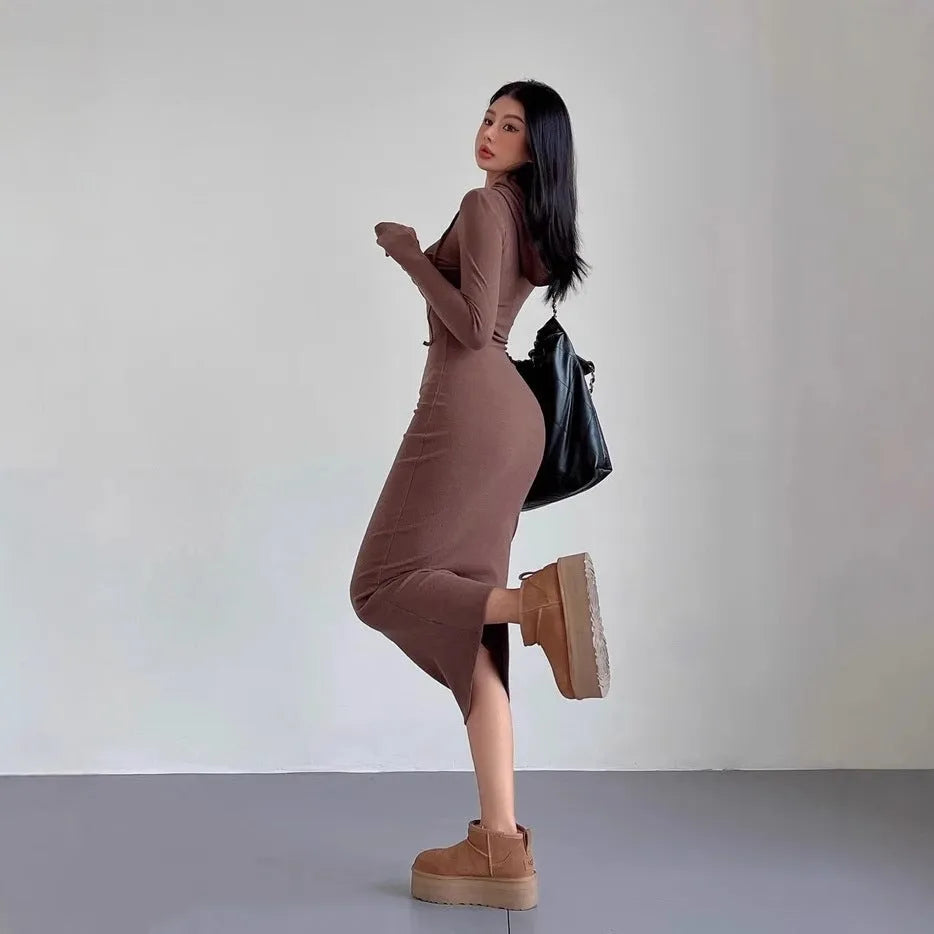 Women's grey hooded long sleeve sheath dress with high waist and over the knee length.