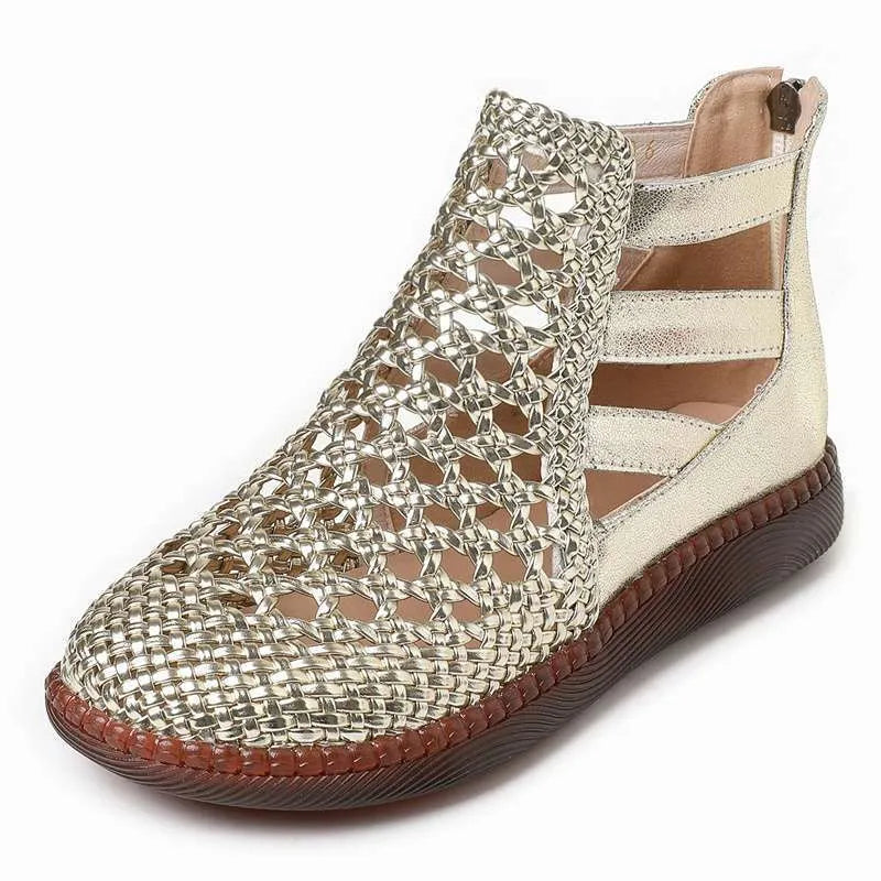 Women's flat sandals with hollow-out design and round toe in gold colour on white background