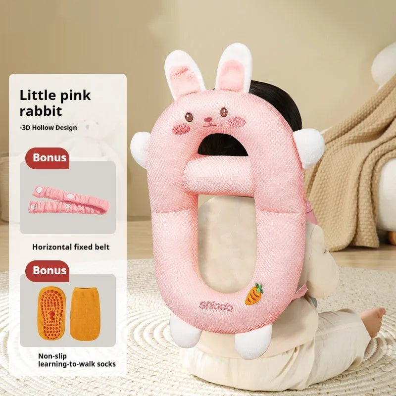 Baby wearing cartoon dinosaur anti-collision pillow for toddler fall protection