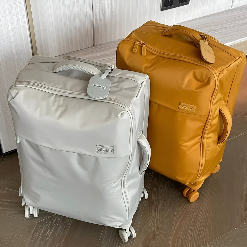 Waterproof Oxford cloth suitcase with universal wheels in bluestone green colour showing three size options