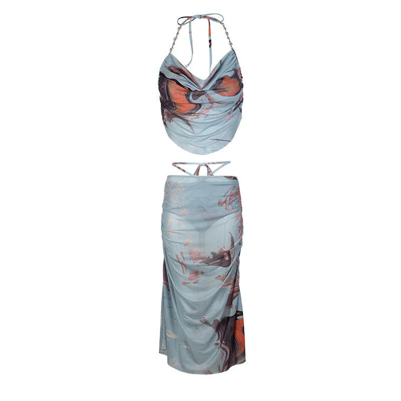 Blue women's three-piece bikini set with diamond chain split detail and backless briefs style.