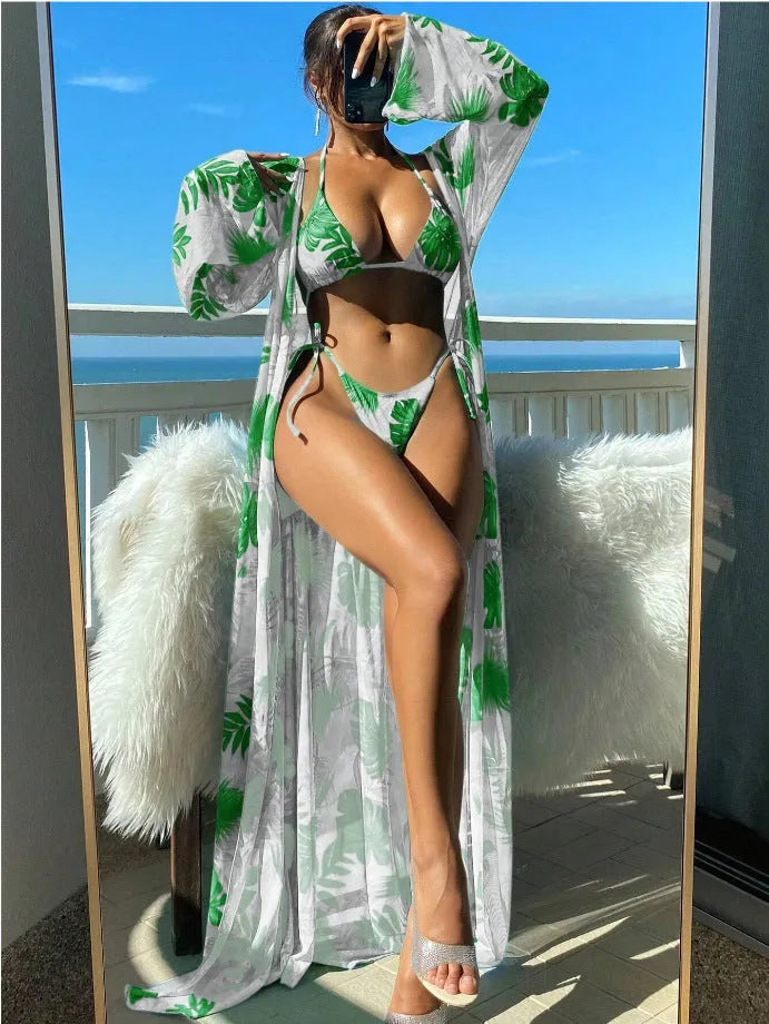 Women's long sleeve swimsuit set with bikini bottoms and cover-up robe in blue colour