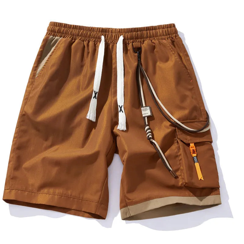 Men's black bamboo fibre sports shorts with a high waist and loose, straight-leg cropped fit on a hanger.