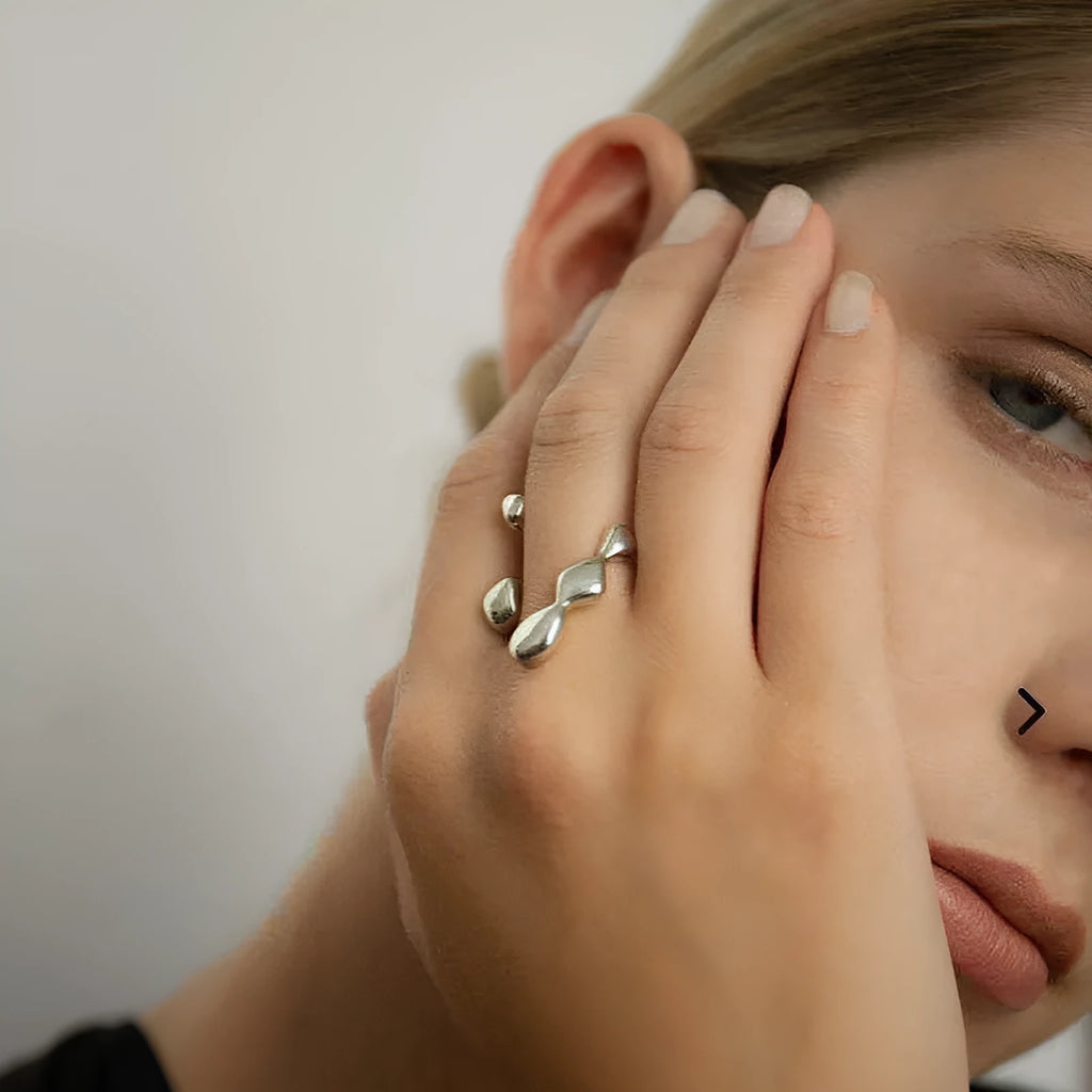 Brass spherical fashion ring in gold or silver colour for women
