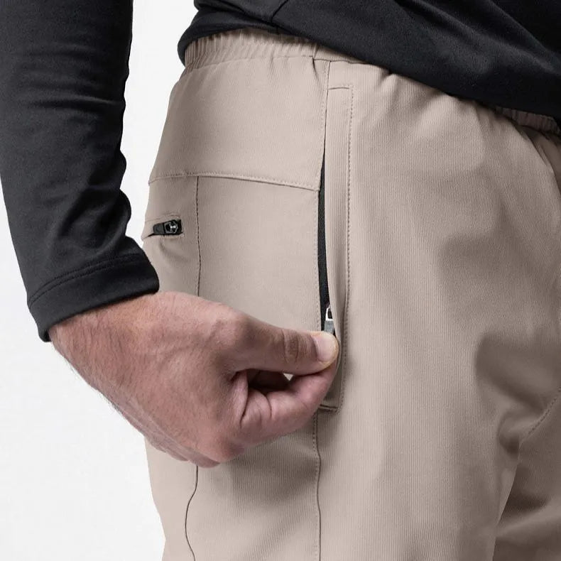 Men's grey quick-dry fitness trousers with ankle-tied design for gym workouts