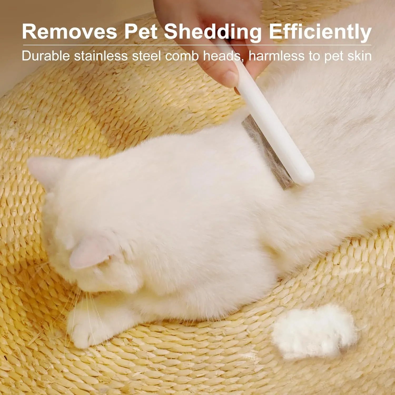 Stainless steel cat grooming comb with rounded teeth and ergonomic handle in green colour