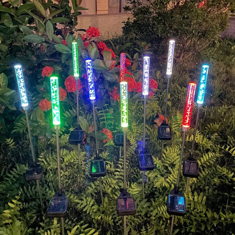 Solar bubble stick lawn lamp in stainless steel and acrylic with warm light and colorful slow flash effect