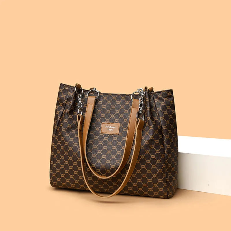 Women's retro style handbag in soft brown PU leather with a polyester lined interior.