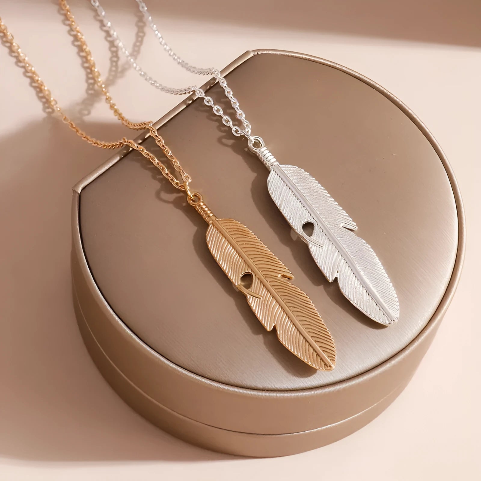 Retro feather tassel necklace for women in gold silver alloy with leaf geometry