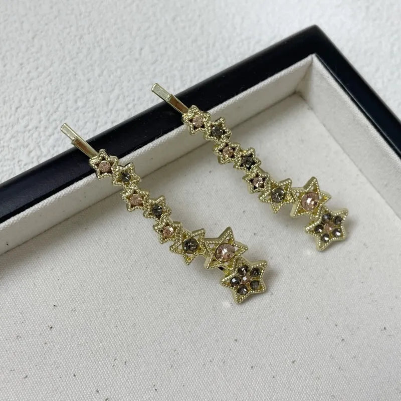 Gold electroplated Korean style barrette with five-pointed star rhinestone design for hair