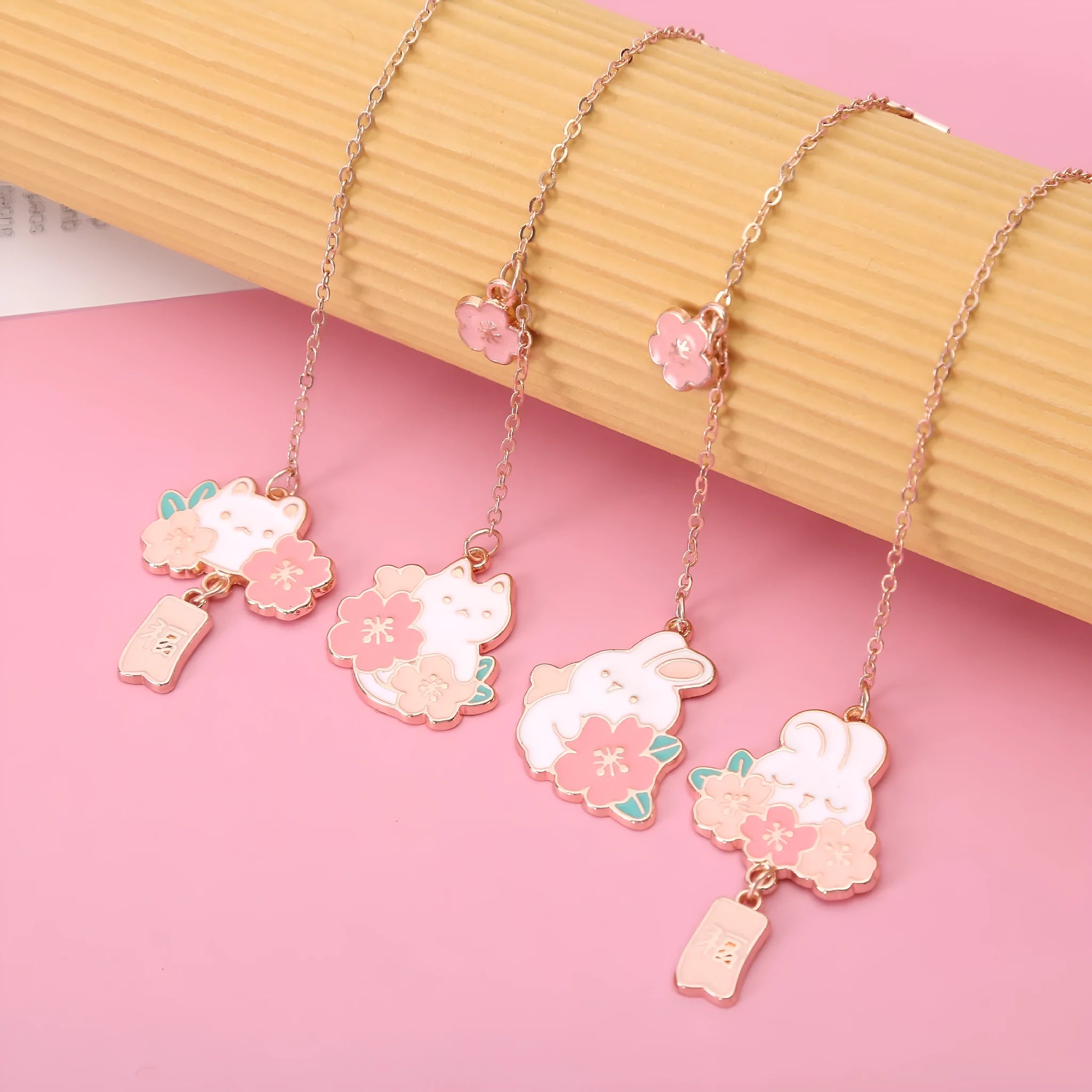 Metal pendant bookmark with cherry blossom cartoon cat design for books and journals