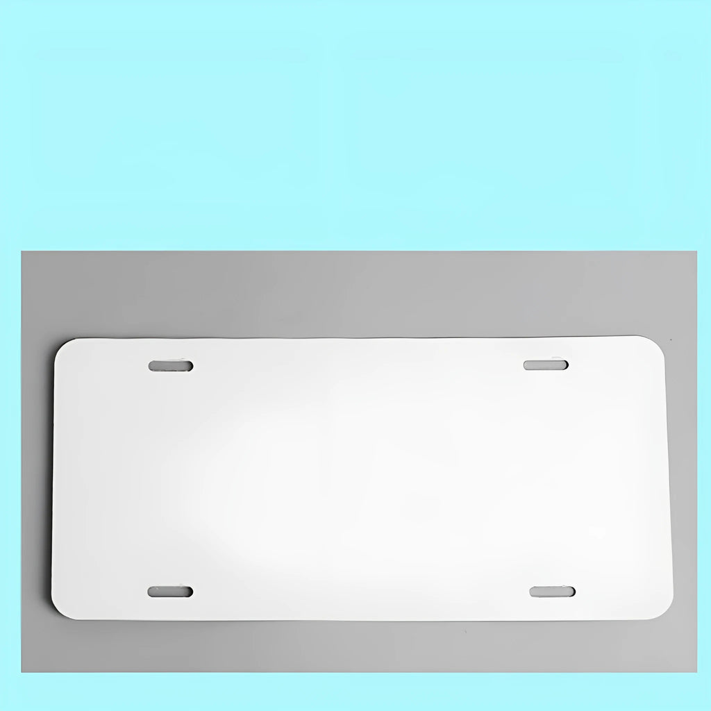A single white rectangular aluminium licence plate blank metal sheet on a grey background.