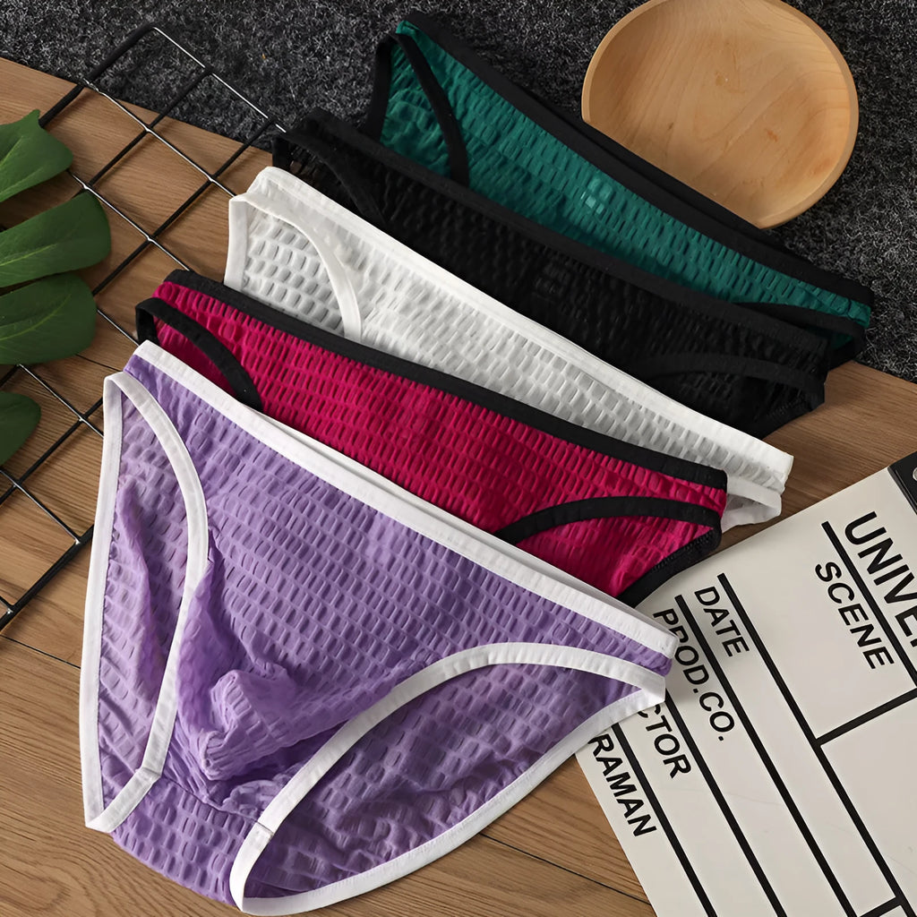 Men's low waist transparent underwear in nylon lace fabric showing breathable quick-drying design