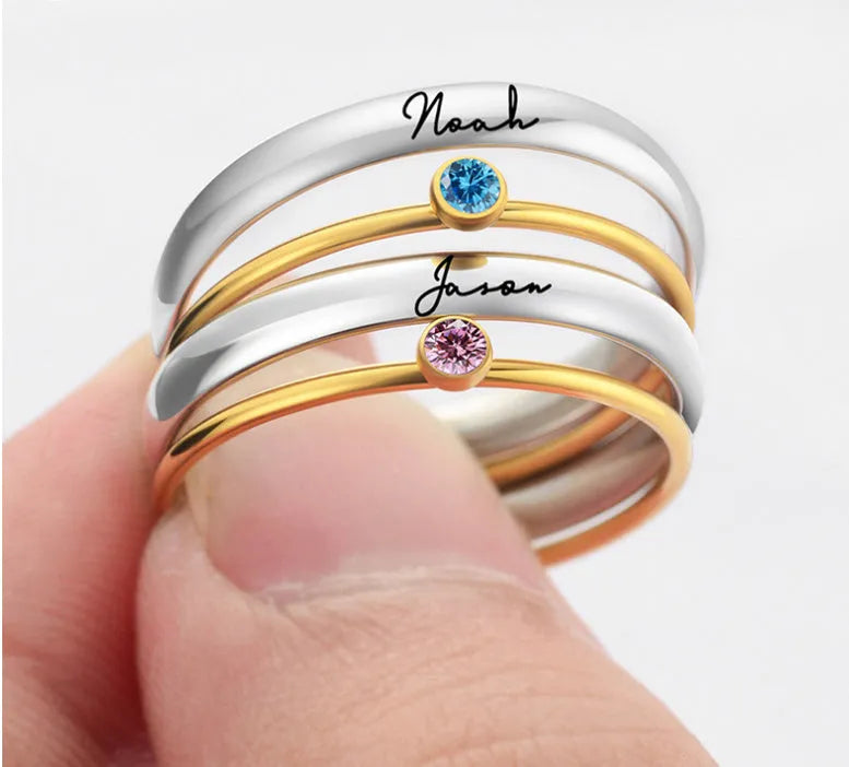 December birthstone engraved titanium steel ring with gold electroplating on geometric band.