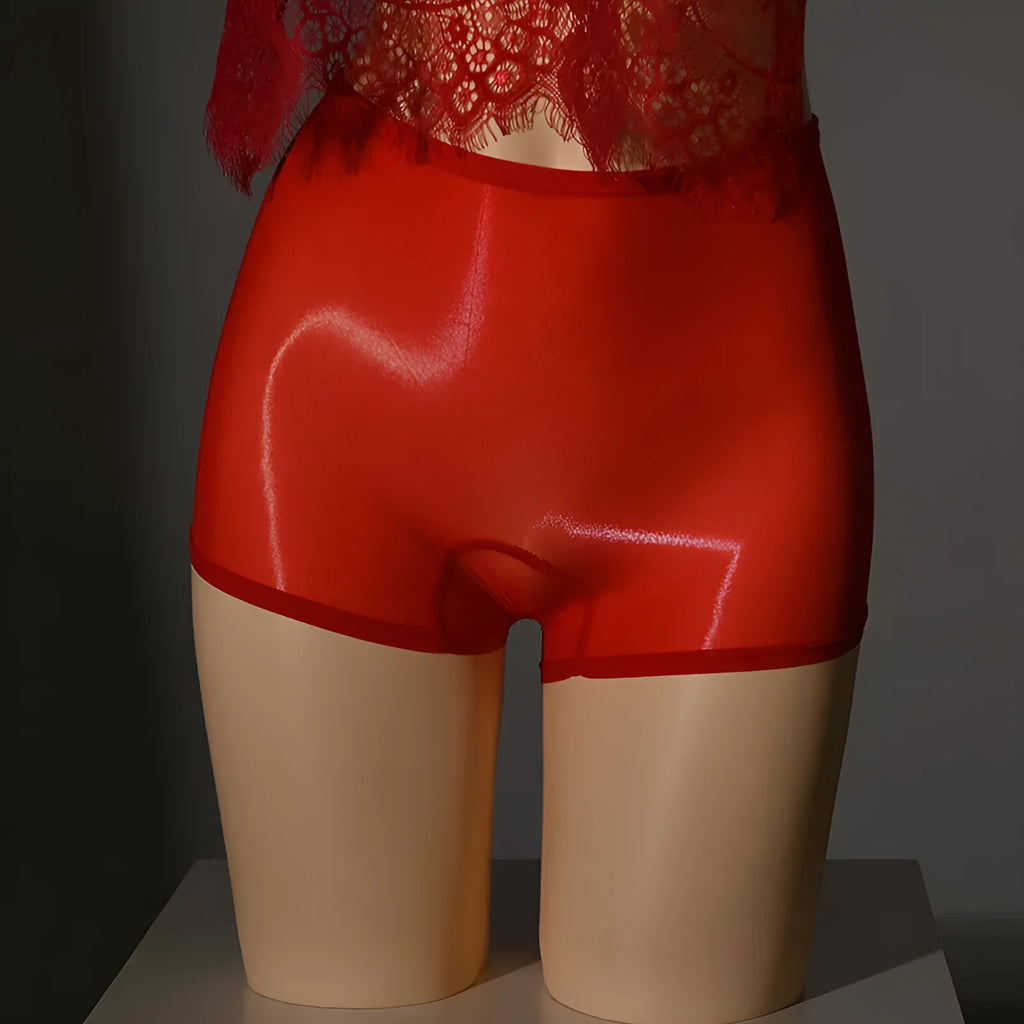 Men's shiny nylon seamless underwear shorts in mid-waist cut, shown in red colour.