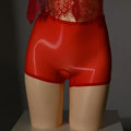 Men's shiny nylon seamless underwear shorts in mid-waist cut, shown in red colour.
