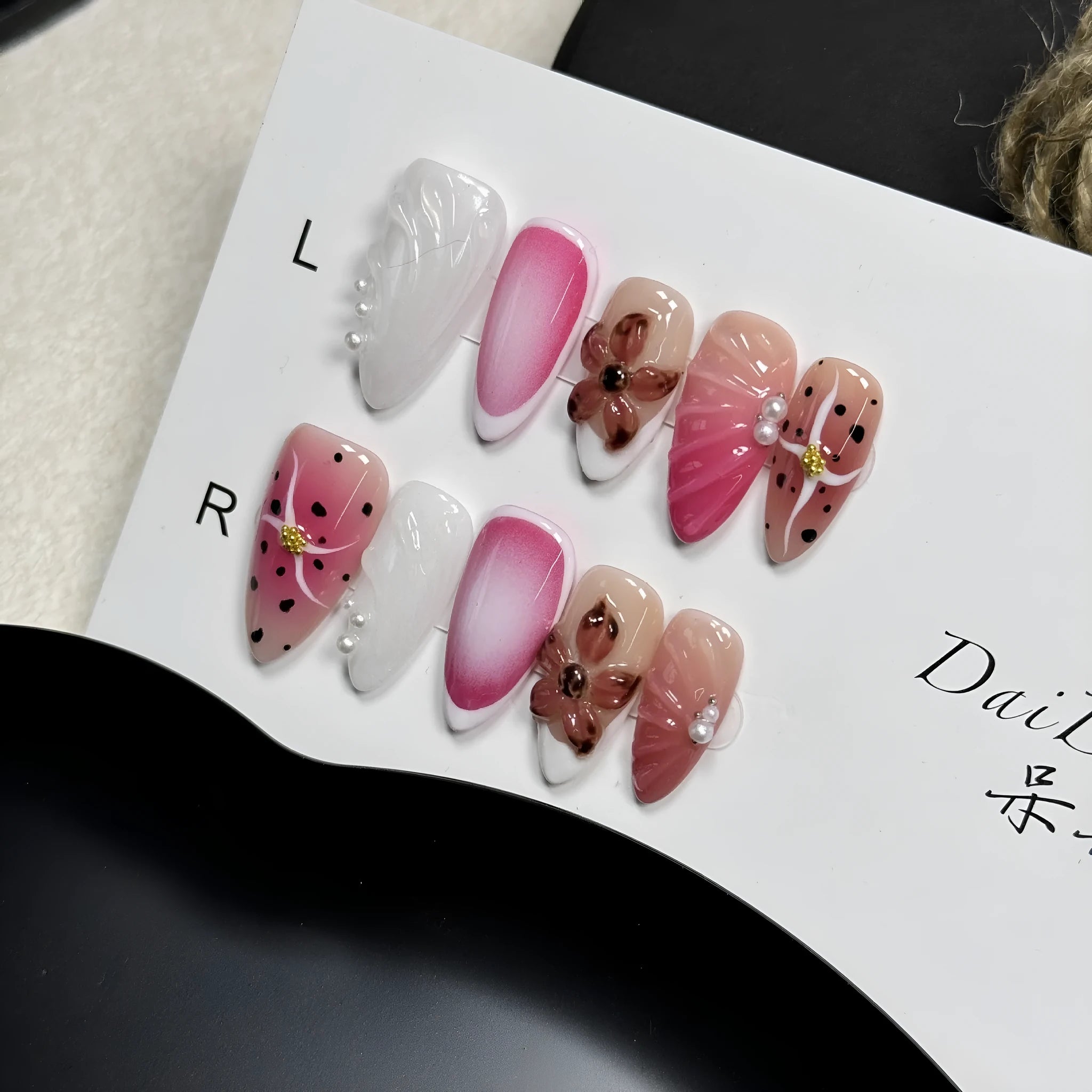 Hand-painted 3D carved nail beauty patches in embossed candy patterns on almond-shaped nails.