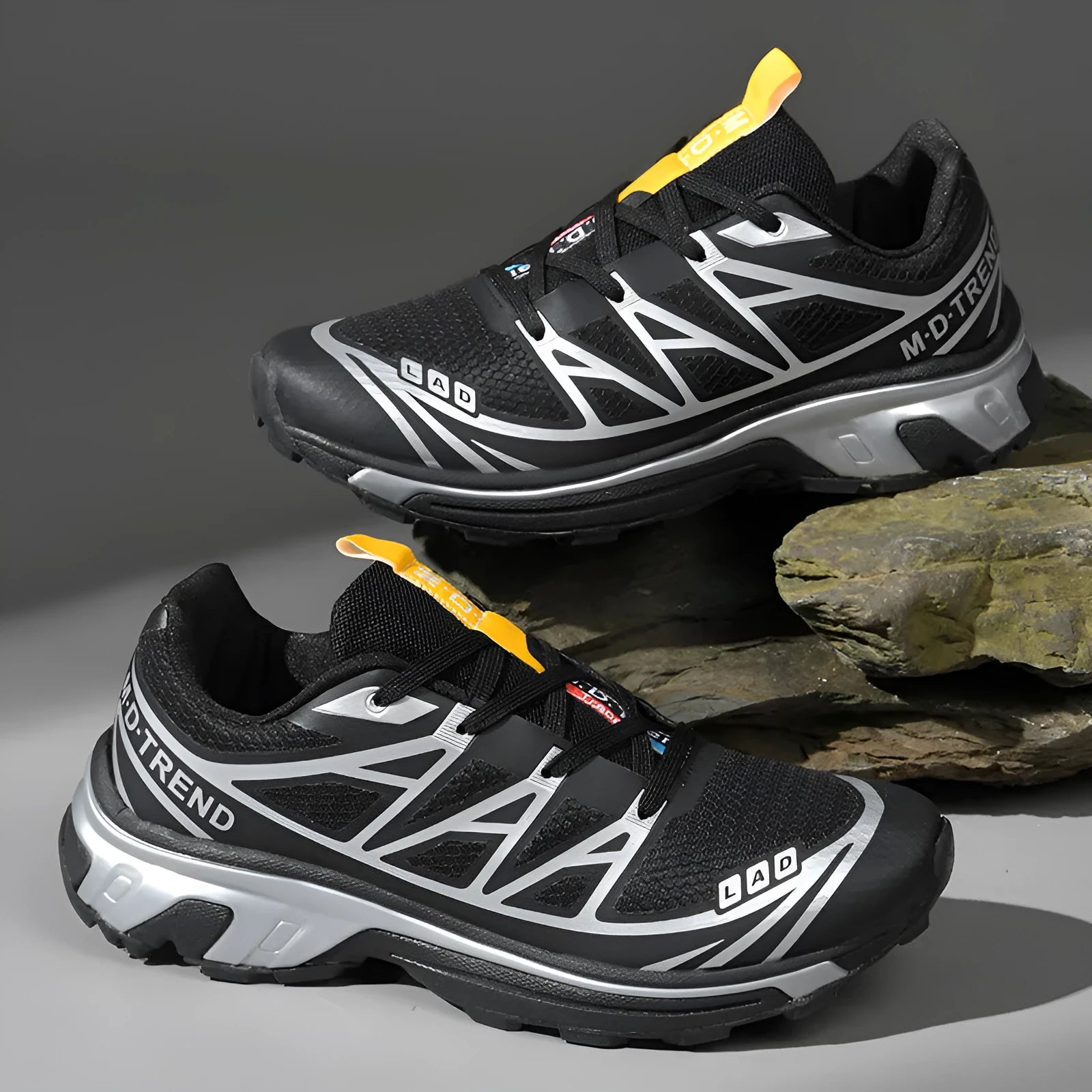 Men's and women's low-top round toe hiking shoes in artificial leather with a lace-up front.