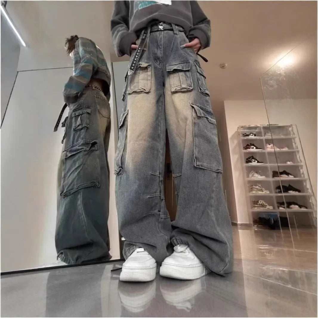 Loose straight-leg distressed jeans with multiple pockets in light blue denim fabric