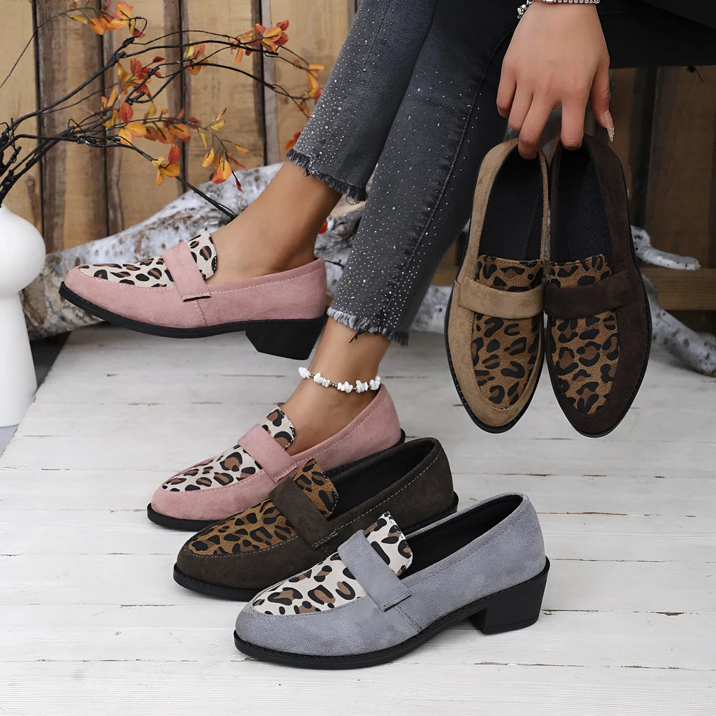 Leopard print suede slip-on pumps with a chunky heel and pointed toe in pink, brown, and khaki.