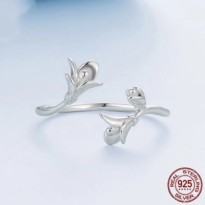 Women's S925 sterling silver lavender open ring with adjustable opening on a plain background