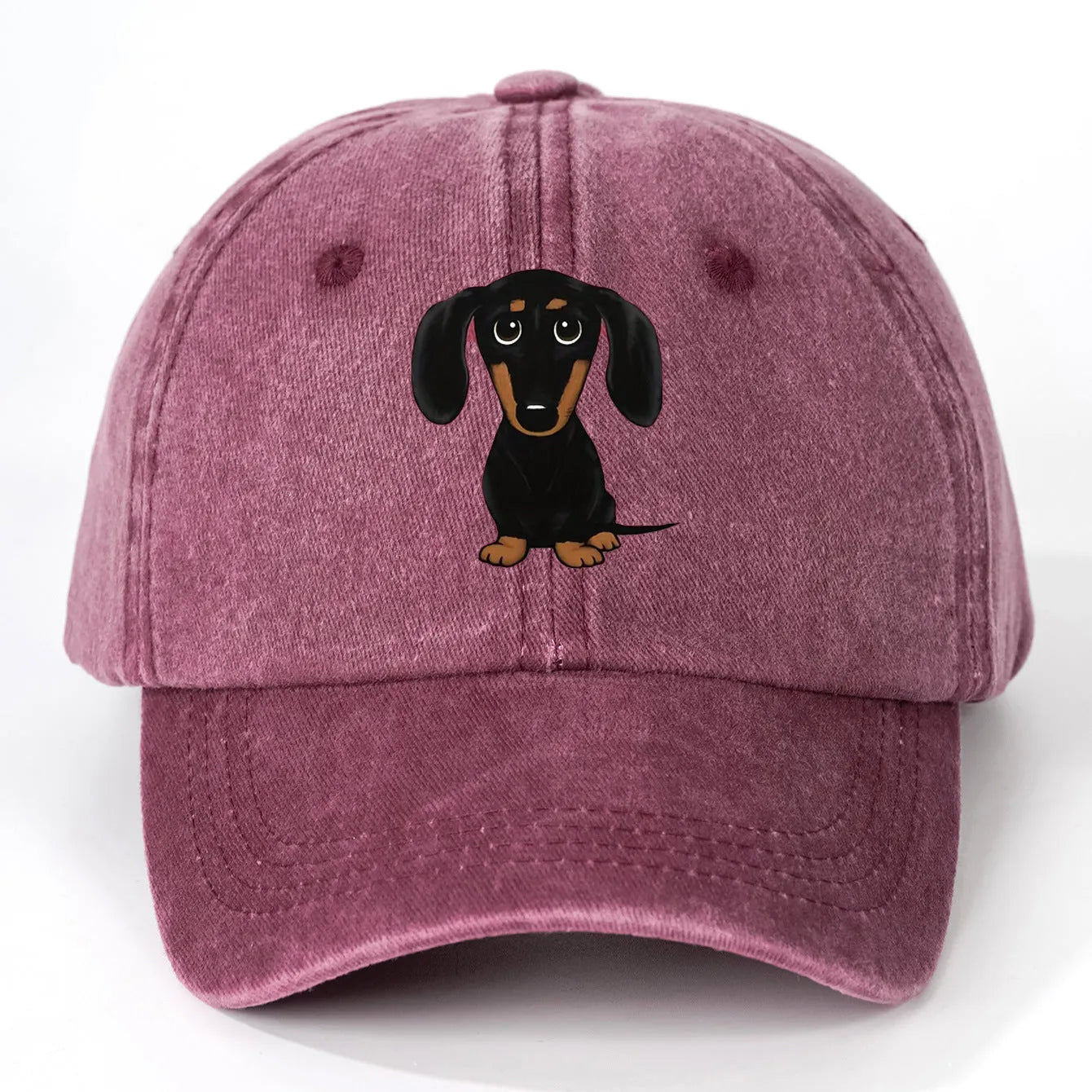 Retro washed navy blue baseball cap with a detailed embroidered dachshund dog print on the front.