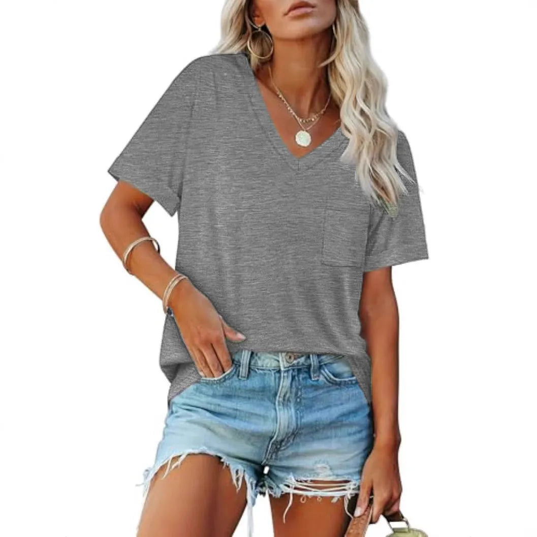 Grey loose V-neck t-shirt with pocket and short sleeves laid flat