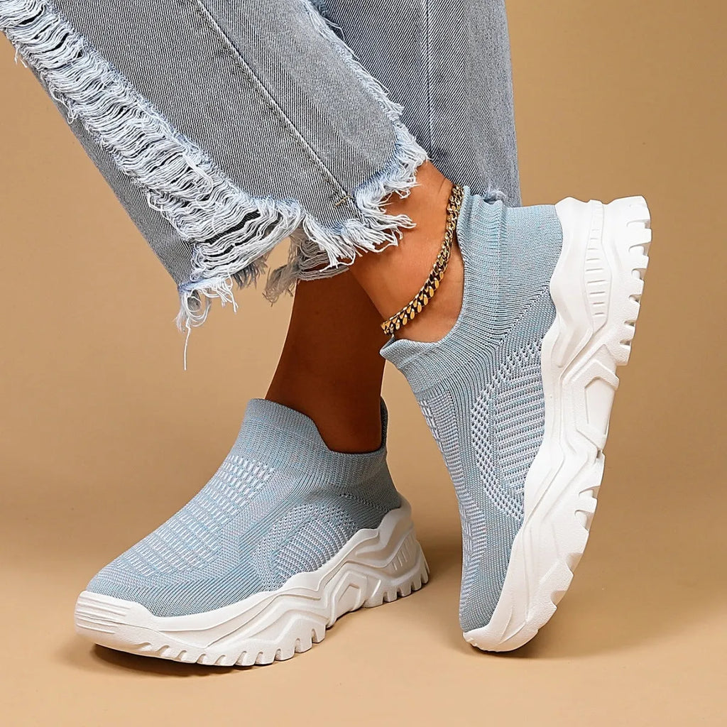 Light blue women's mesh slip-on sports shoes with round toe and mid heel