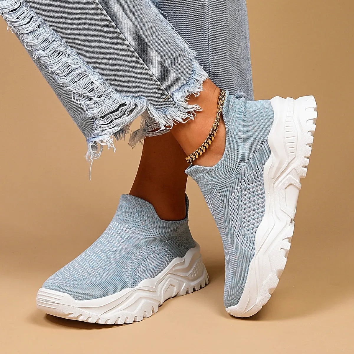 Light blue women's mesh slip-on sports shoes with round toe and mid heel
