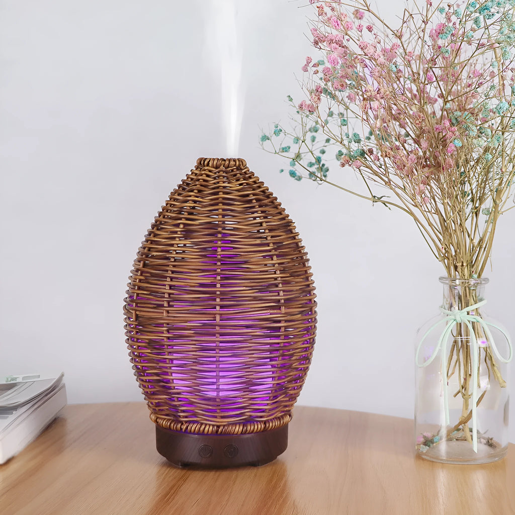 Light wood grain rattan-style ultrasonic aroma diffuser with 100ml capacity tank.
