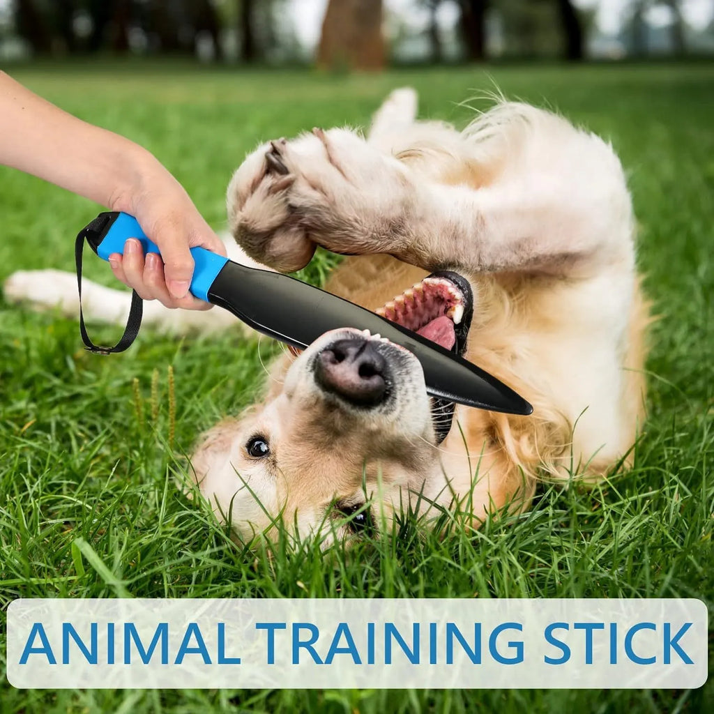 Blue handled nylon dog break stick measuring 35cm on a grass background.