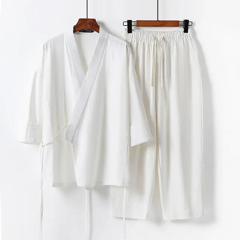 Women's apricot coloured cotton linen hanfu style cardigan and trousers two-piece suit.
