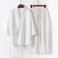 Women's apricot coloured cotton linen hanfu style cardigan and trousers two-piece suit.