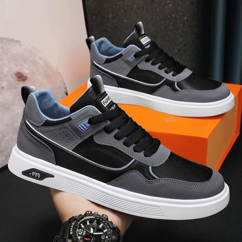Men's low-top canvas board shoes in black, beige, or grey with leather stitching details.