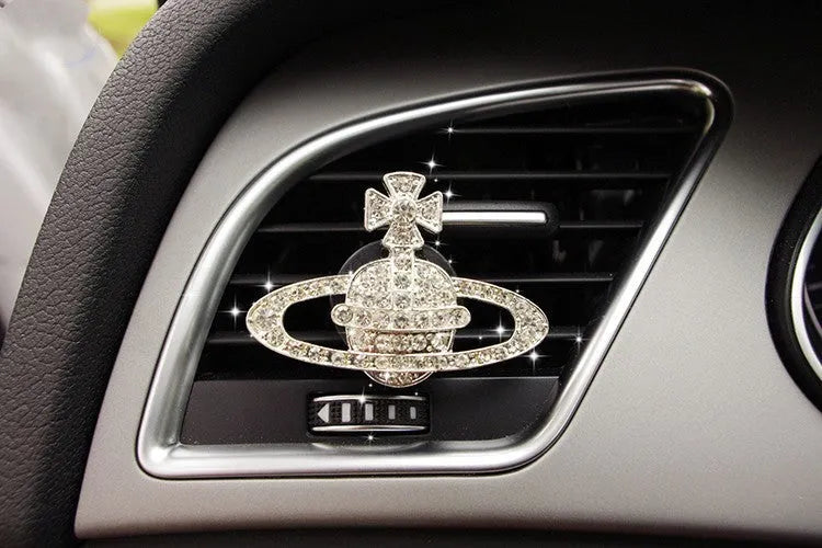 Alloy car perfume clip with liquid fruity scent attached to air vent in various cartoon styles