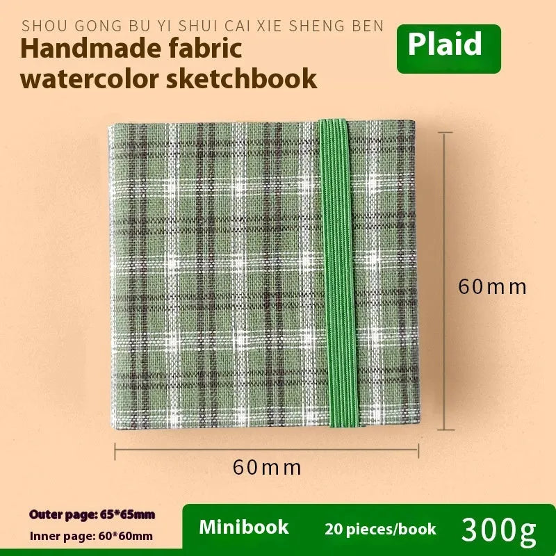 Feiluniao fabric watercolour notebook showing floral and animal cover designs in 185mm length