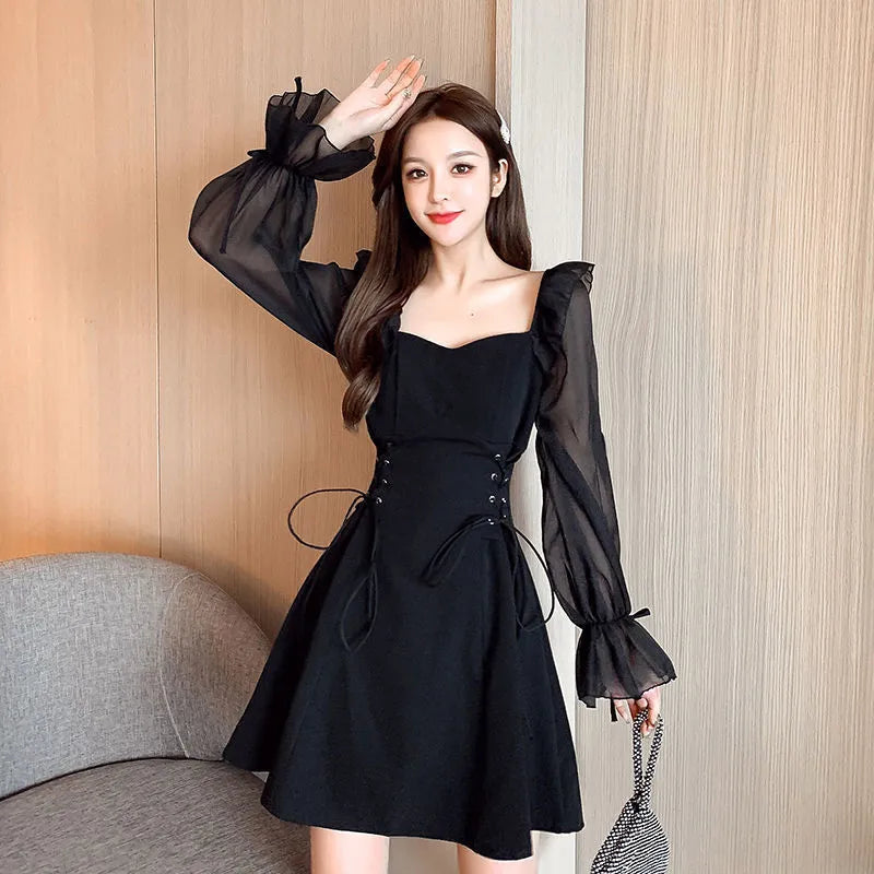 White women's long sleeve chiffon patchwork dress with a waist-slimming fit and long skirt.