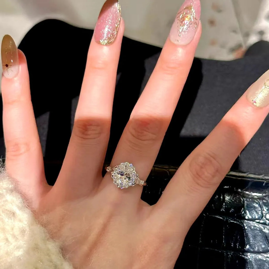 Adjustable silver geometric ellipse bridal bouquet ring with diamond surface treatment