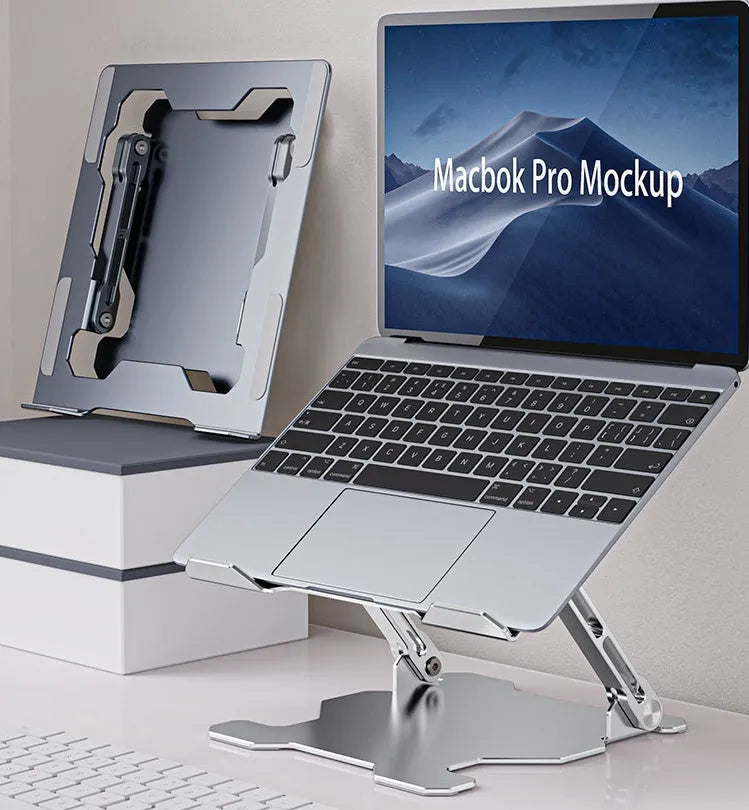 Grey adjustable aluminium laptop stand in open and folded positions on a wooden desk.
