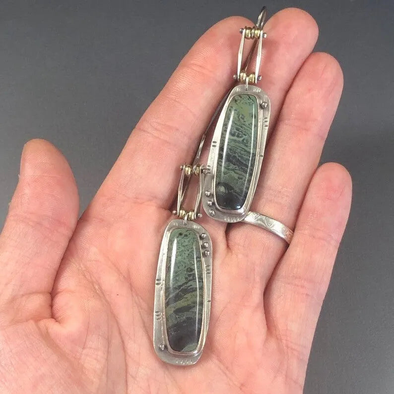 Geometric alloy earrings with two-colour marble pattern design