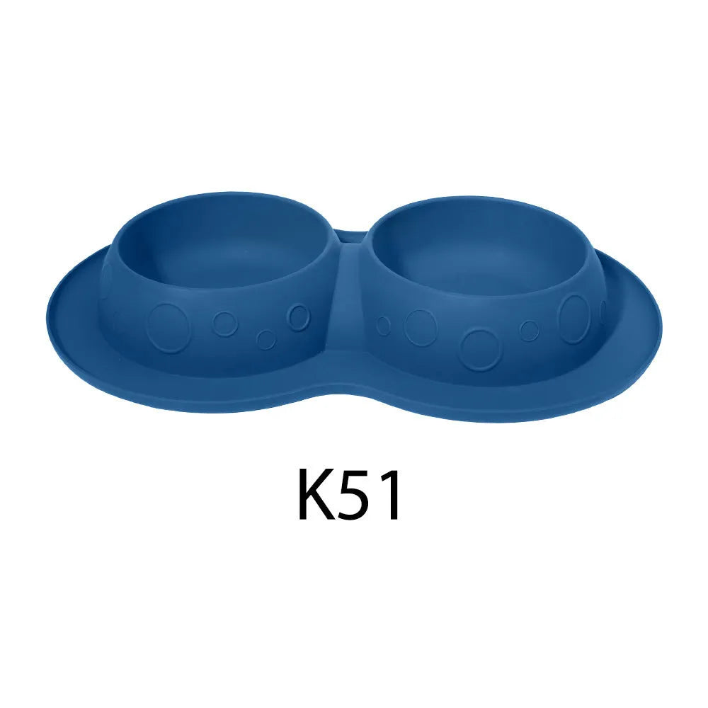 Blue silicone non-slip waterproof pet feeding mat with raised edge and bowl area, 45x30cm