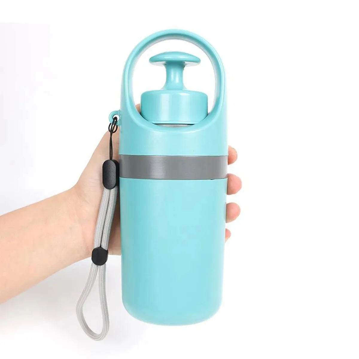Blue plastic dog pooper scooper with claw mechanism and roll of waste bags
