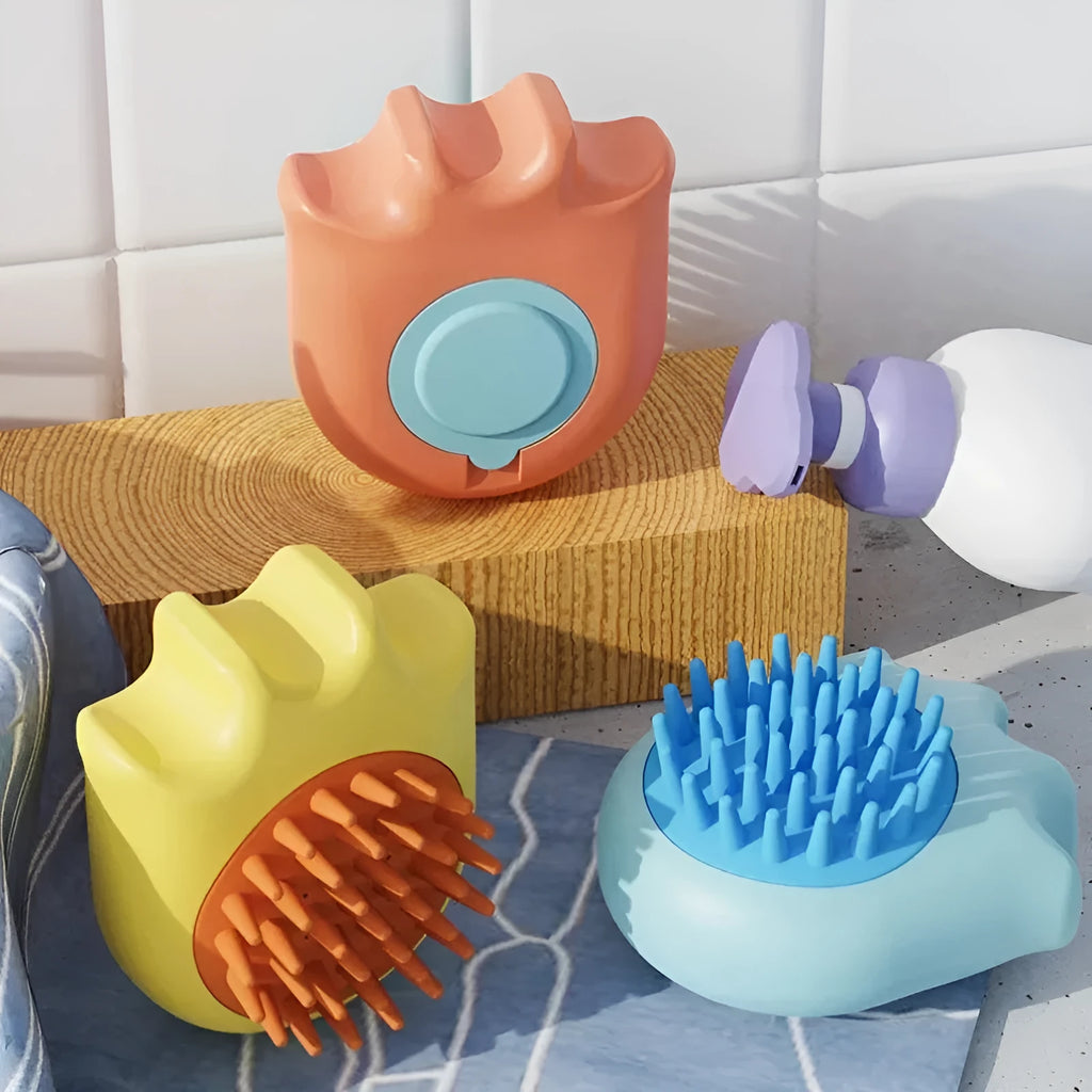 Blue pet bath brush with built-in shampoo compartment for washing cats and dogs