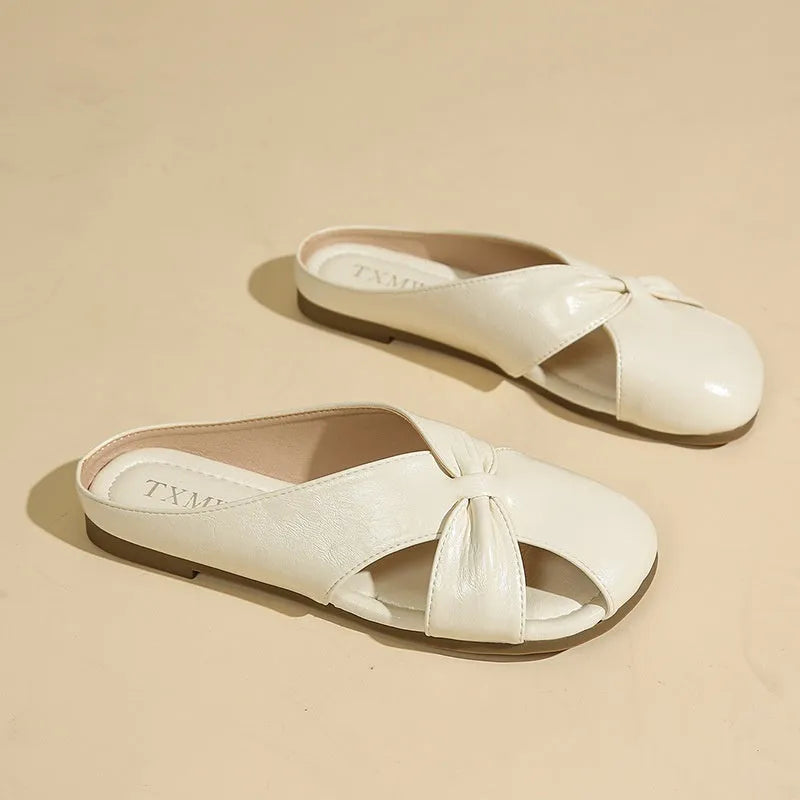 Women's hollow-out half slippers in beige with patent PU leather upper and rubber sole