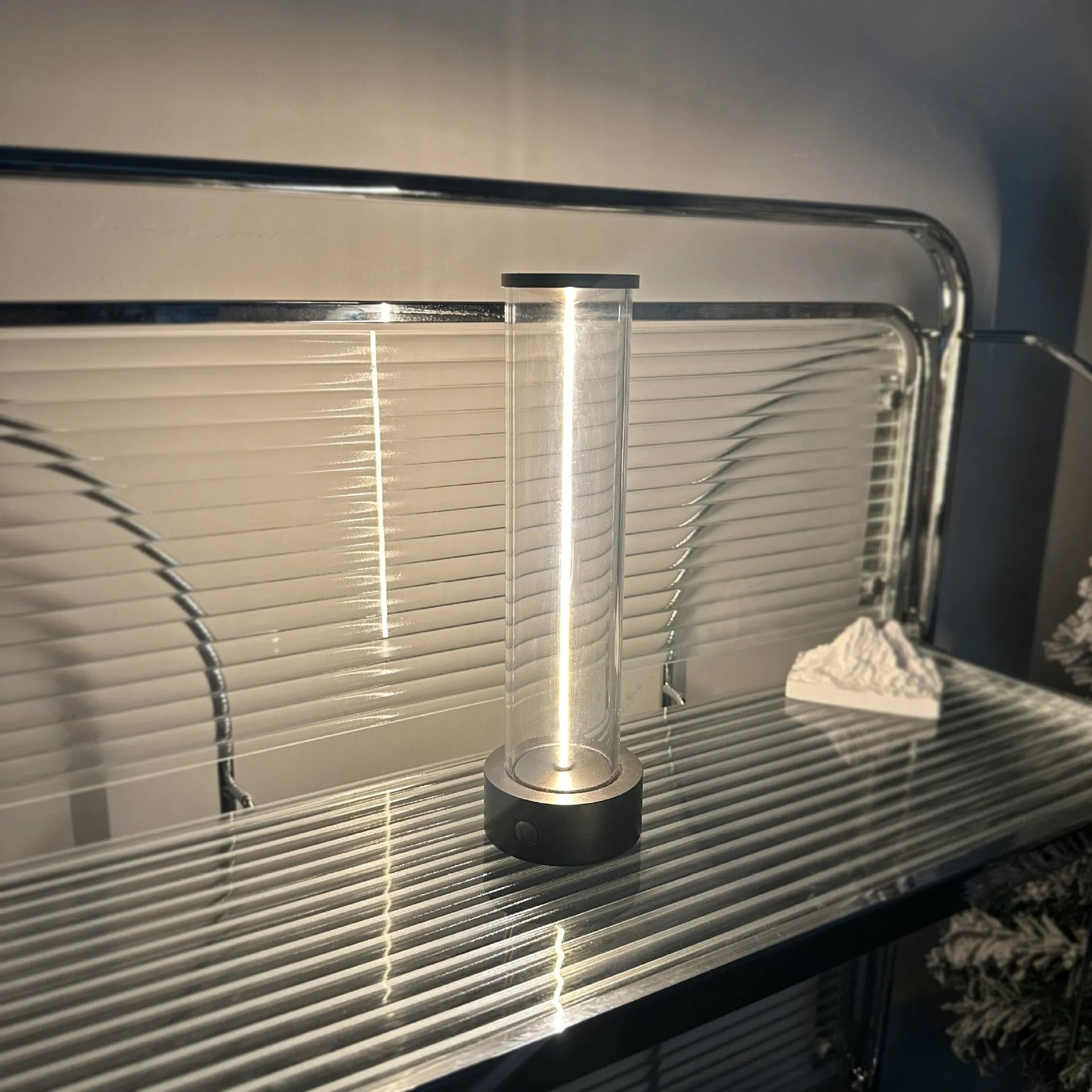 Modern white LED light strip with glass and magnetic base for USB charging